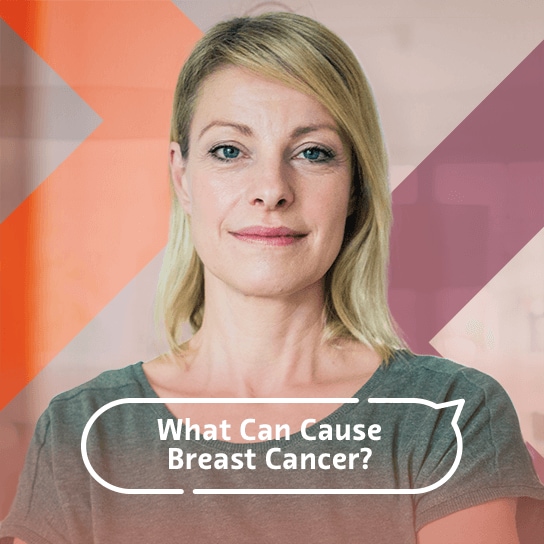 A portrait of a blonde woman smiles and a title in a speech bubble that asks, "What causes breast cancer?"